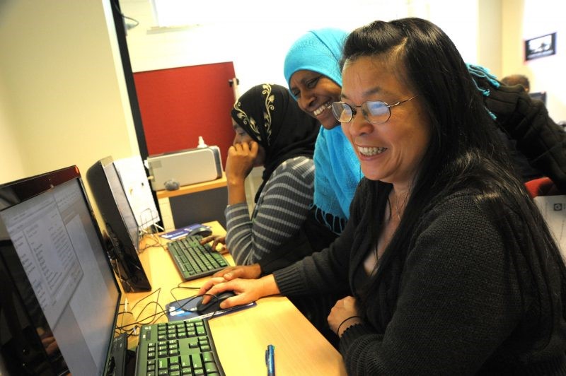 Community members in computer lab